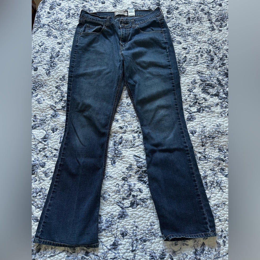 Levi’s dark wash blue jeans